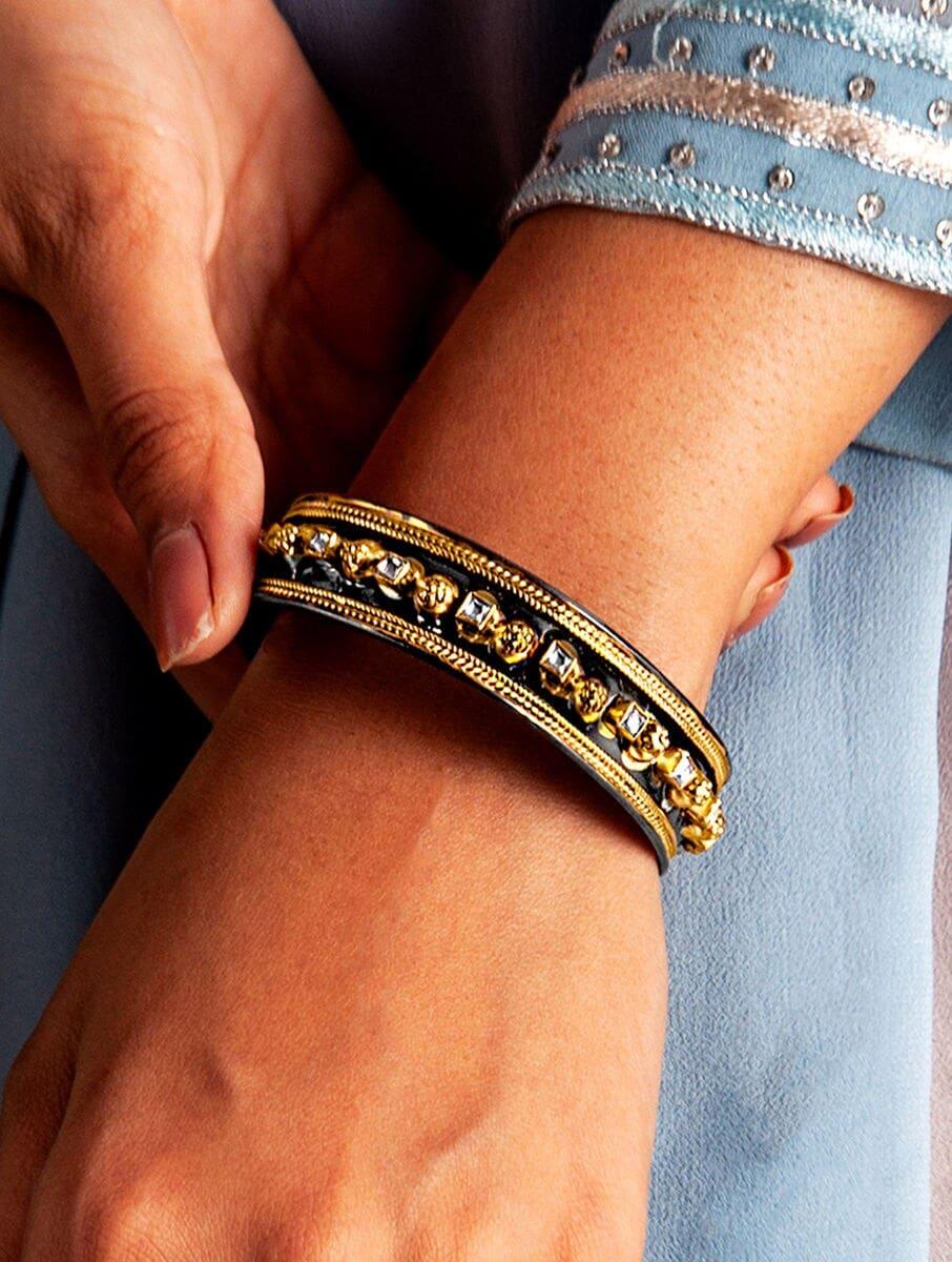 women gold dual tone silver cuffs &amp; bracelet