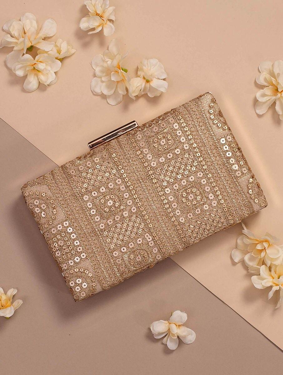 women gold georgette clutches