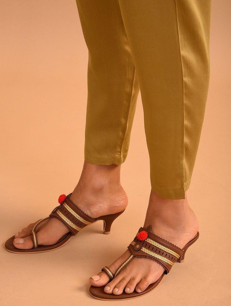 women gold modal solid ankle length slim fit pants