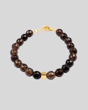 women gold-plated beaded bracelet with lobster closure