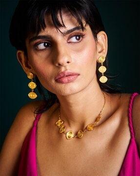 women gold-plated drishti dangler earrings