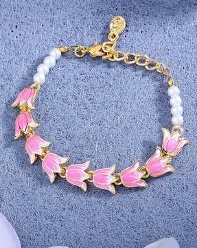 women gold-plated lotus-shaped link bracelet with lobster closure