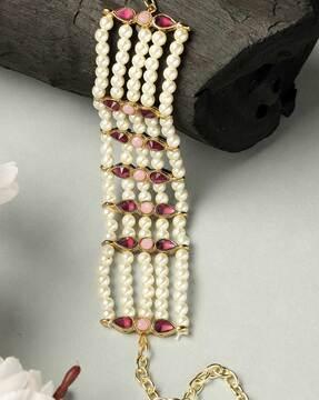 women gold-plated pearl & kundan-studded bracelet