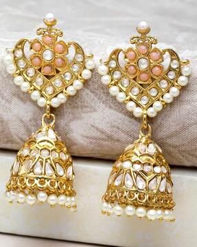 women gold-plated pearl kundan-studded jhumkas