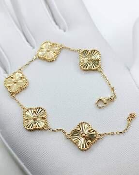 women gold-plated stone-studded bracelet
