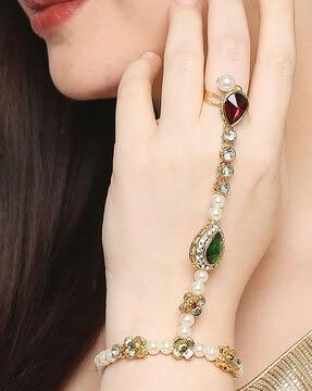 women gold-plated stone-studded bracelet