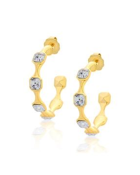 women gold-plated stone-studded earrings