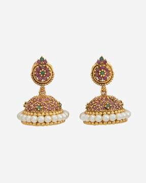 women gold-plated stone-studded jhumka earrings