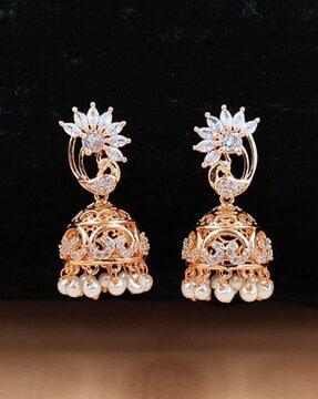 women gold-plated stone-studded jhumkas