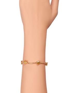 women gold-plated stone-studded link bracelet