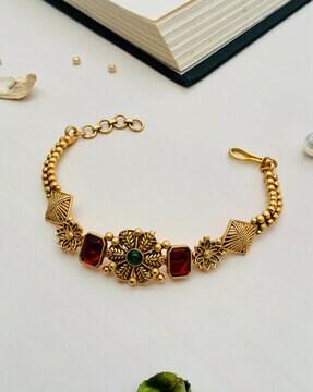 women gold-plated stone-studded link bracelet