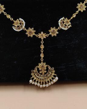 women gold-plated stone-studded maangtikka