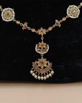 women gold-plated stone-studded maangtikka