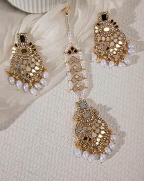 women gold-plated stone-studded mang tika with earrings