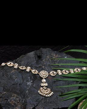 women gold-plated stone-studded pearl drop mang tikka