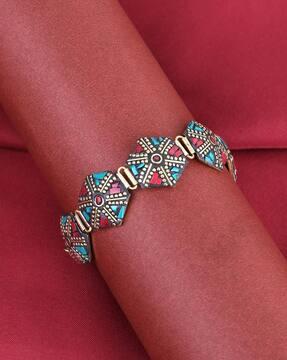 women gold-plated stone-studded wrap bracelet