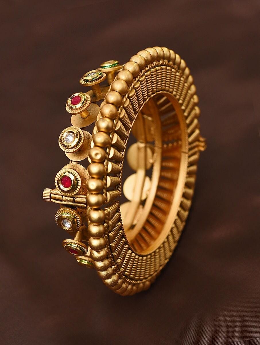 women gold screw brass bangles