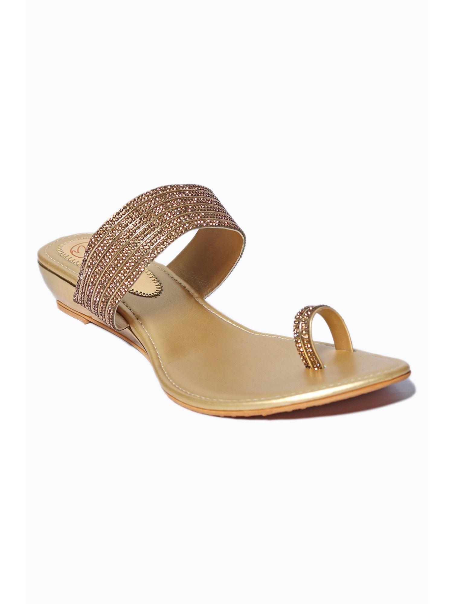 women gold toned embellished wedge sandals