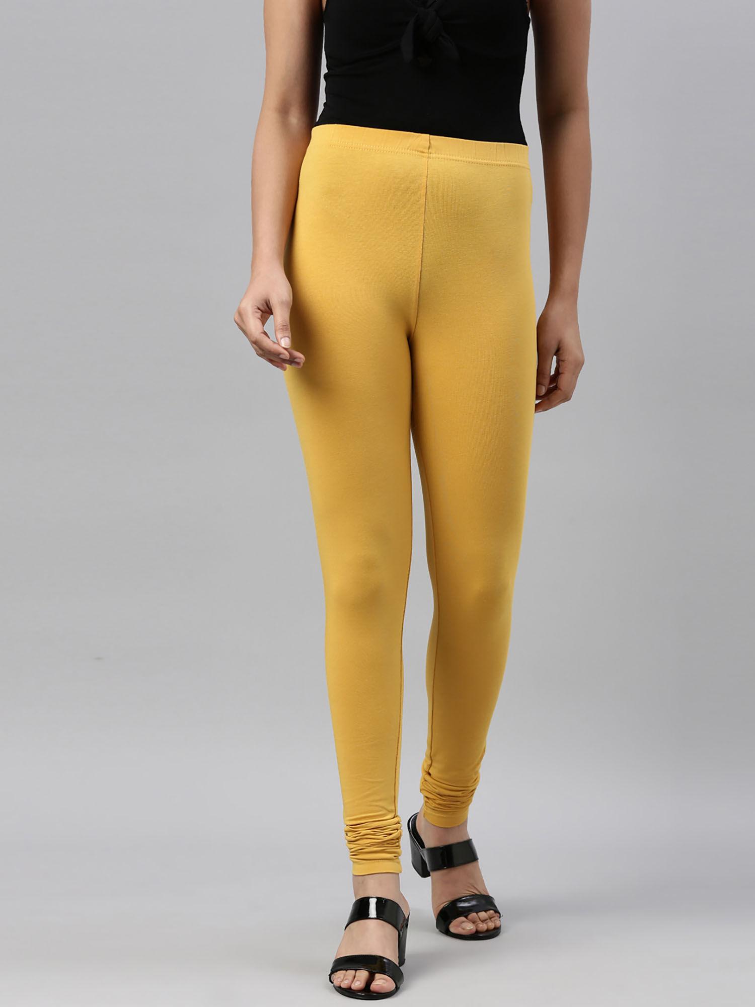 women golden yellow cotton churidar leggings
