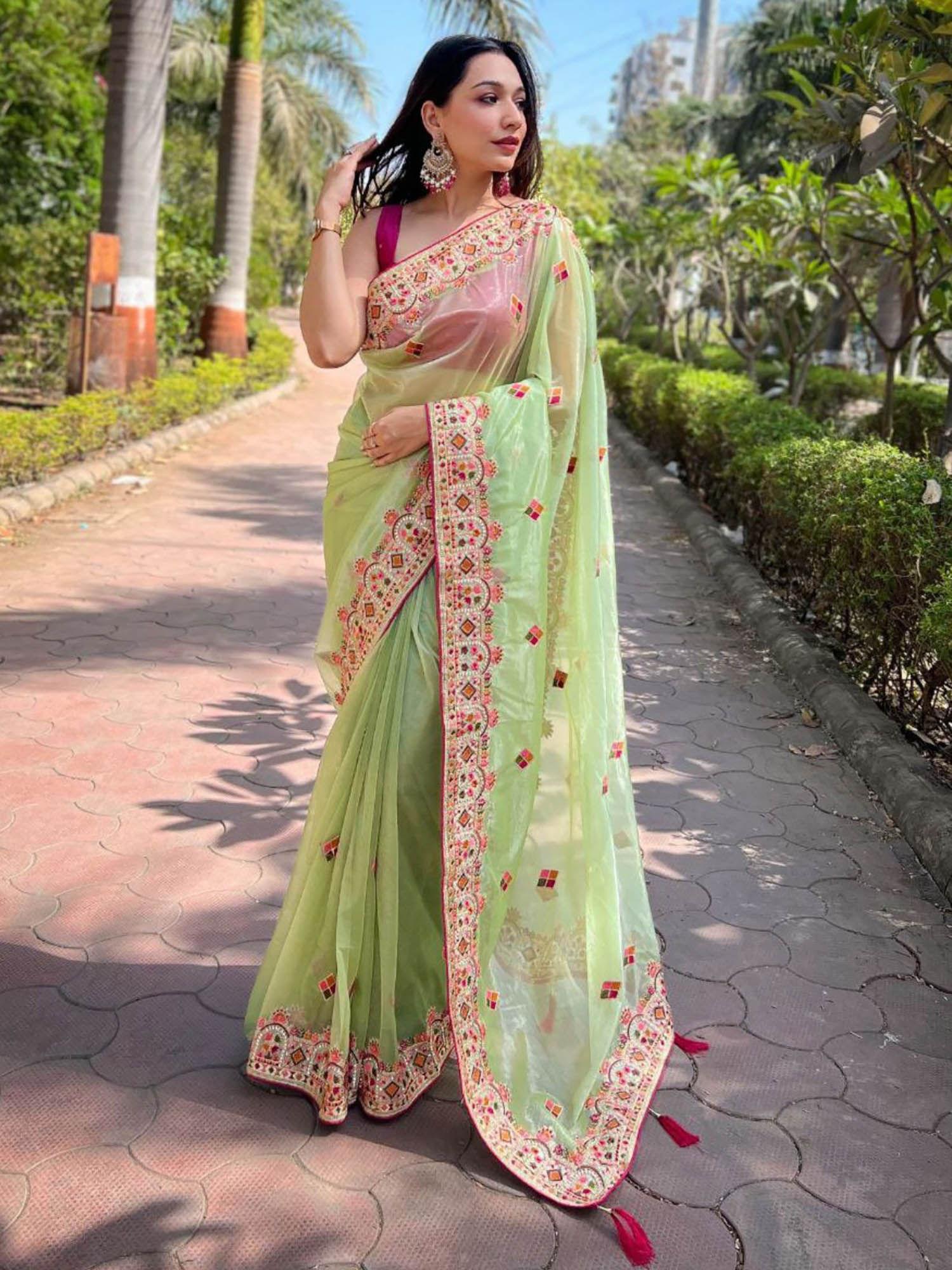 women green embroidered net saree with unstitched blouse