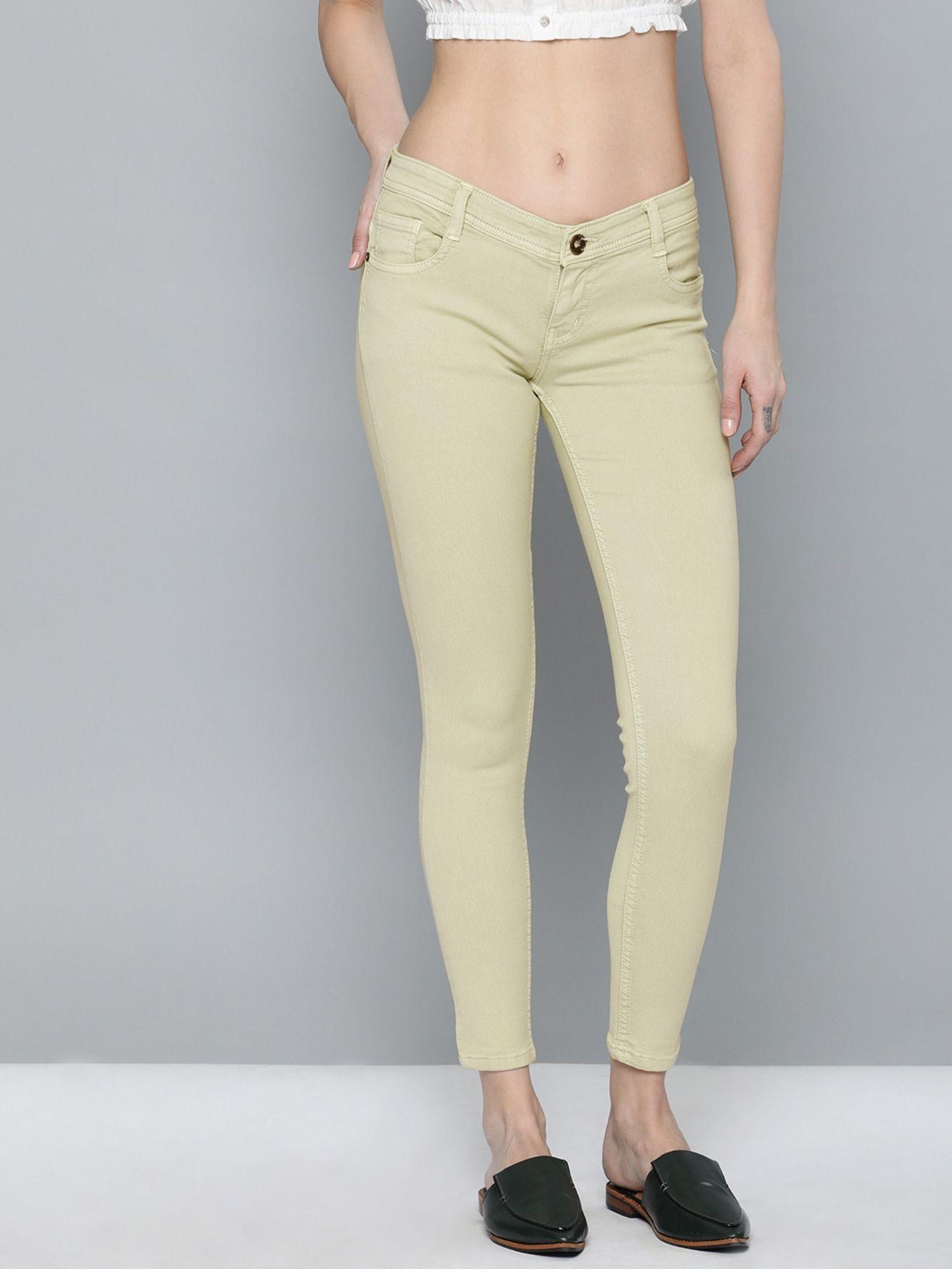 women green slim fit mid-rise clean look stretchable jeans