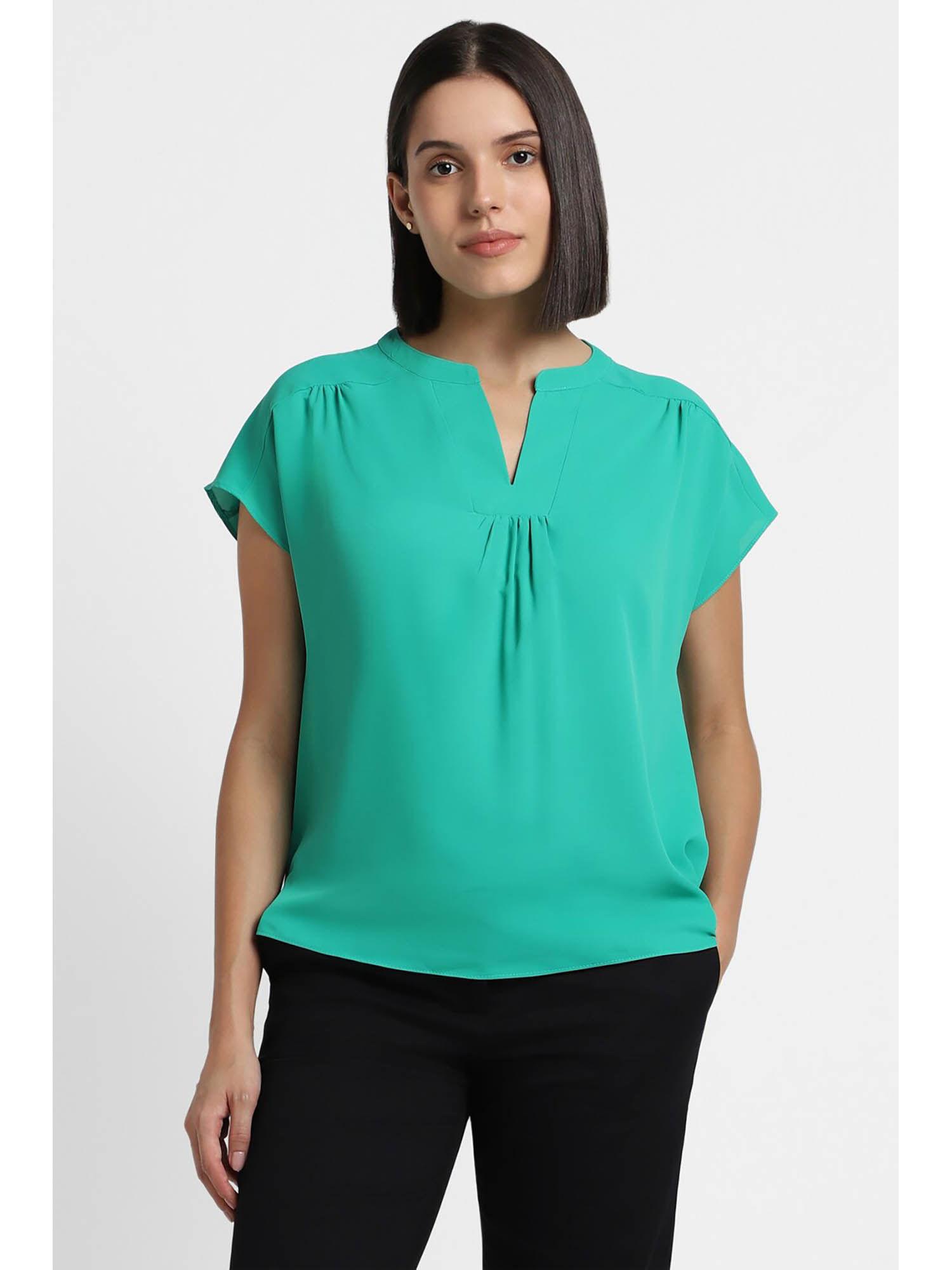 women green solid casual top