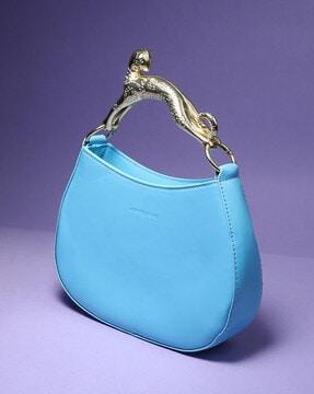 women handbag with metallic jaguar handle