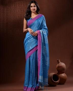 women handwoven saree with geometric motifs