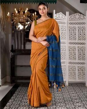 women handwoven saree with tassels