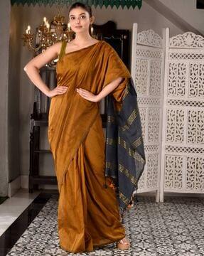 women handwoven saree with tassels