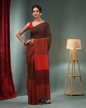 women handwoven saree with tassels