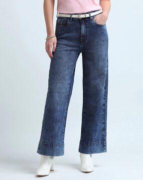 women heavily washed bootcut jeans