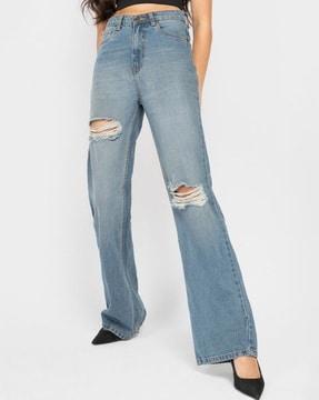 women heavily washed distressed bootcut jeans