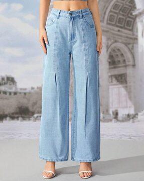 women heavily washed flared jeans