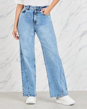 women heavily washed straight jeans