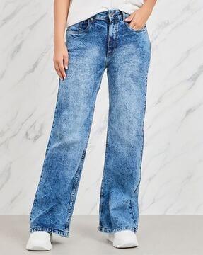 women heavily washed wide-leg jeans