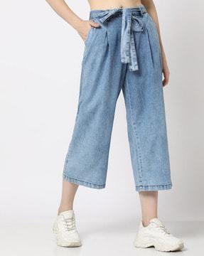 women heavy-wash flared jeans