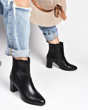 women heeled ankle-length boots with zip-detail