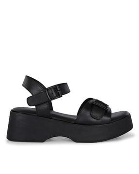 women heeled wedges with buckle fastening