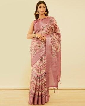 women ikat pattern saree with contrast zari border