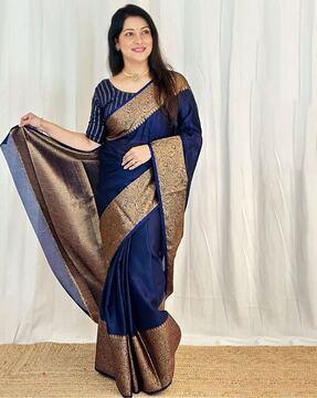 women kanjeevaram saree with paisley woven border