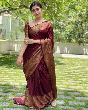 women kanjeevaram saree with paisley woven border