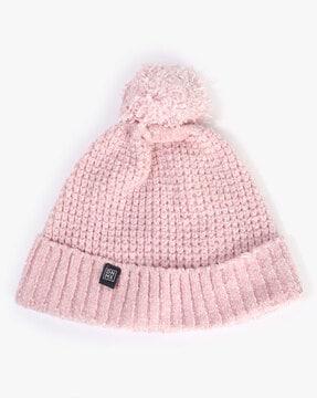 women knitted beanie with pom-pom