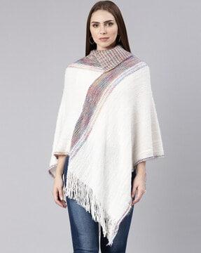 women knitted poncho with fringes