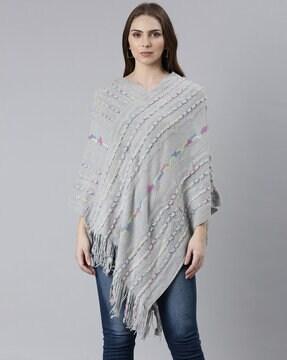 women knitted poncho with fringes