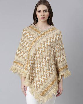 women knitted poncho with fringes