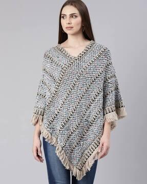 women knitted poncho with fringes