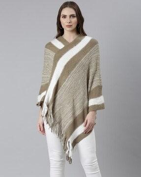 women knitted poncho with fringes