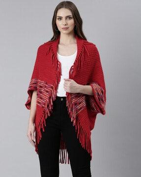 women knitted poncho with fringes
