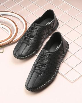 women laser-cut lace-up shoes